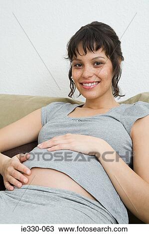 Smiling pregnant woman View Large Photo Image Stock Image - Smiling pregnant woman. Fotosearch