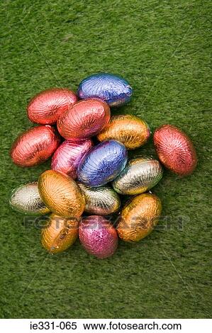 Easter eggs in a pile View Large Photo Image Stock Photography - Easter eggs in a pile. Fotosearch