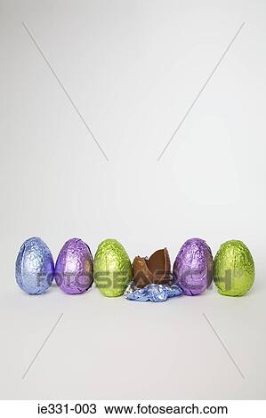 Easter eggs in a row View Large Photo Image Stock Image - Easter eggs in a row. Fotosearch