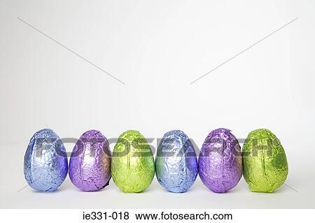 Stock Photo - Easter eggs in a row. Fotosearch