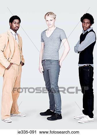 Stock Image - Three stylish men. Fotosearch