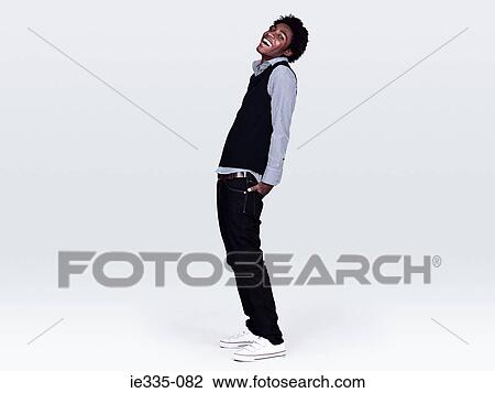 Stock Image - Young man laughing. Fotosearch