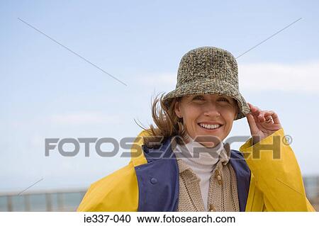 Woman in a hat View Large Photo Image Stock Image - Woman in a hat. Fotosearch