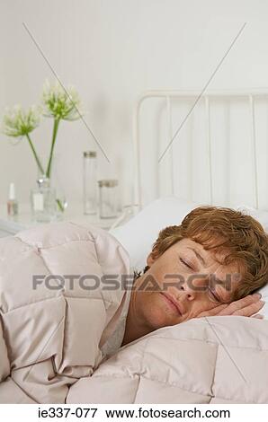 Woman sleeping View Large Photo Image Stock Photo - Woman sleeping. Fotosearch