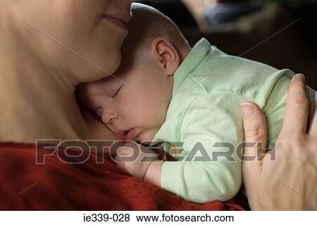 Stock Photo - Baby and mother. Fotosearch