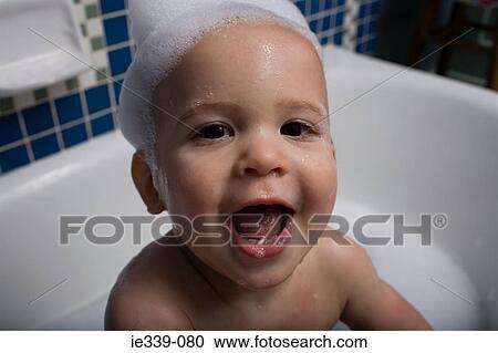 Baby with bubbles on their head View Large Photo Image Stock Image - Baby with bubbles on their head. Fotosearch