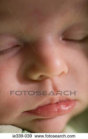 Close up of baby face View Large Photo Image Stock Photo - Close up of baby face. Fotosearch