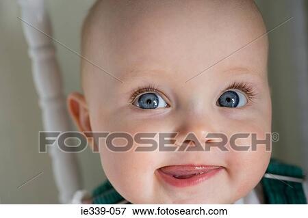 Face of a baby girl View Large Photo Image Stock Photo - Face of a baby girl. Fotosearch