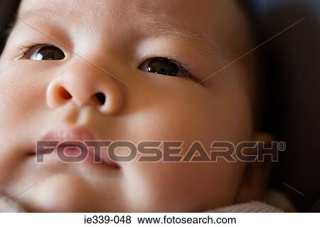 Face of a baby View Large Photo Image Stock Photo - Face of a baby. Fotosearch