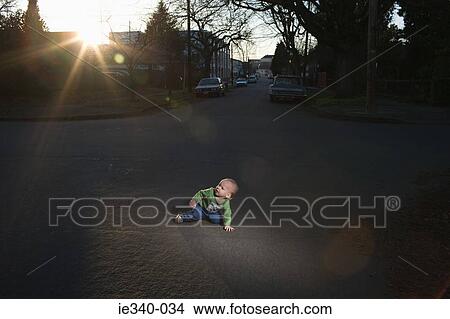 Picture - Baby in the road. Fotosearch