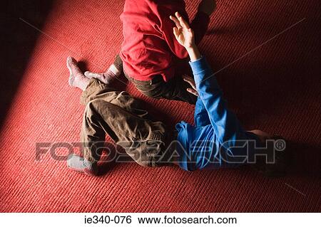 Boys playfighting View Large Photo Image Stock Photograph - Boys playfighting. Fotosearch