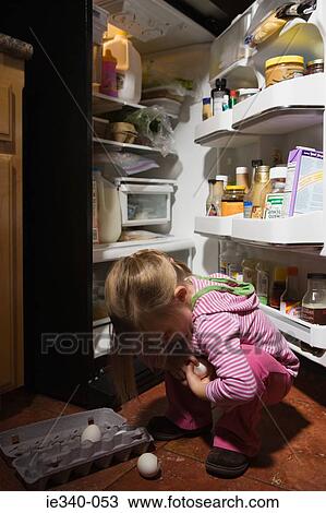 Girl with dropped eggs View Large Photo Image Stock Image - Girl with dropped eggs. Fotosearch