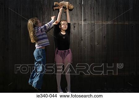Girls fighting over doll View Large Photo Image Picture - Girls fighting over doll. Fotosearch