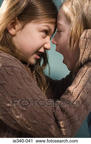 Stock Image - Girls fighting. Fotosearch