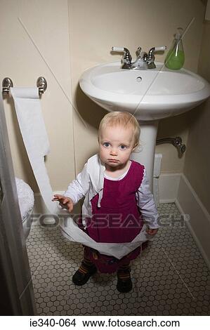 Little girl with toilet paper View Large Photo Image Picture - Little girl with toilet paper. Fotosearch