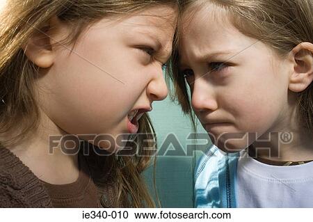 Sisters fighting View Large Photo Image Stock Image - Sisters fighting. Fotosearch
