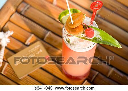Cocktail and credit card View Large Photo Image Stock Image - Cocktail and credit card. Fotosearch