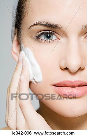 Stock Photograph - Woman cleansing. Fotosearch