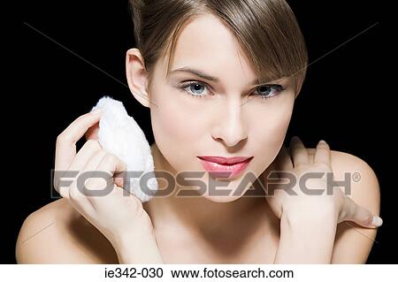 Woman with powder puff View Large Photo Image Stock Image - Woman with powder puff. Fotosearch
