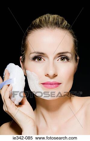 Woman with powder puff View Large Photo Image Stock Photography - Woman with powder puff. Fotosearch