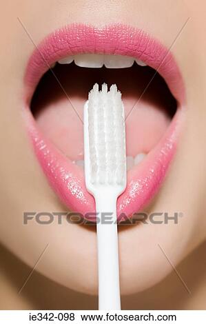 Woman with toothbrush View Large Photo Image Stock Photo - Woman with toothbrush. Fotosearch