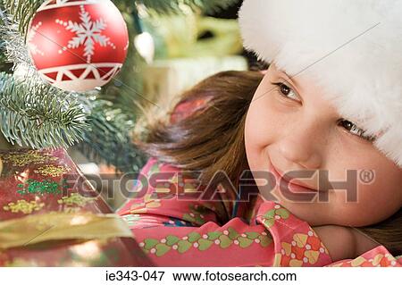 Stock Photo - Girl at christmas. Fotosearch