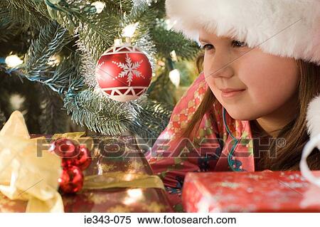 Girl at christmas View Large Photo Image Stock Photography - Girl at christmas. Fotosearch