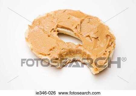 A bagel with a missing bite View Large Photo Image Stock Photograph - A bagel with a missing bite. Fotosearch