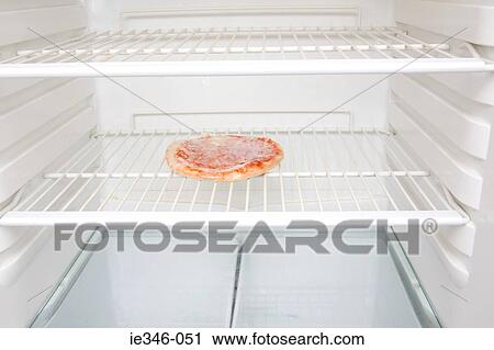 A pizza in a fridge View Large Photo Image Stock Image - A pizza in a fridge. Fotosearch