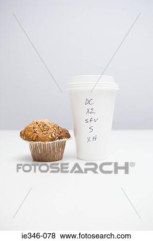 Coffee and a muffin View Large Photo Image Stock Photo - Coffee and a muffin. Fotosearch