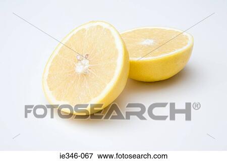 Grapefruit halves View Large Photo Image Stock Photo - Grapefruit halves. Fotosearch