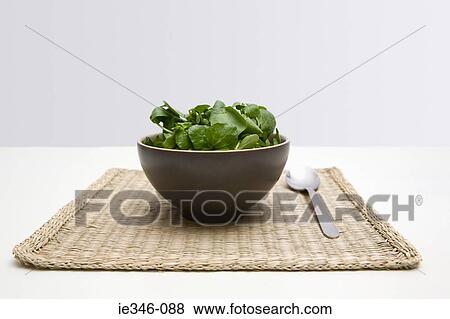 Spinach and watercress in a bowl View Large Photo Image Stock Photo - Spinach and watercress in a bowl. Fotosearch
