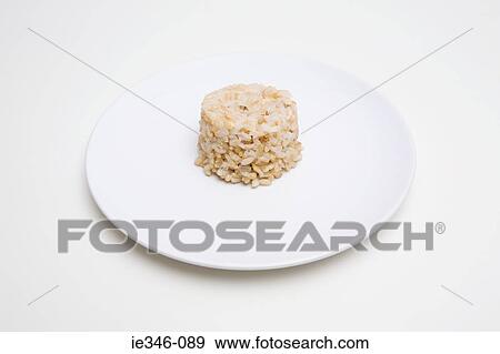 Stack of brown rice View Large Photo Image Stock Photo - Stack of brown rice. Fotosearch