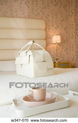 Bag on a bed View Large Photo Image Stock Image - Bag on a bed. Fotosearch