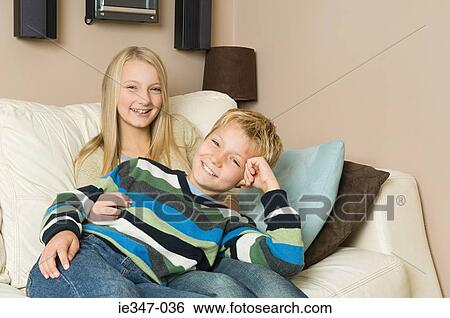 Brother and sister at home View Large Photo Image Stock Photograph - Brother and sister at home. Fotosearch