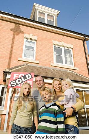 Family outside new house View Large Photo Image Stock Image - Family outside new house. Fotosearch