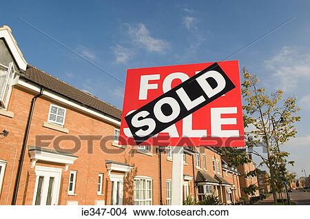 Sold sign and houses View Large Photo Image Picture - Sold sign and houses. Fotosearch
