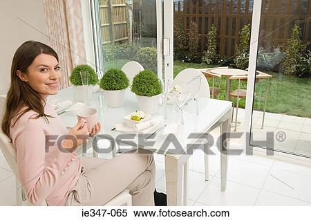 Woman having a coffee View Large Photo Image Stock Photography - Woman having a coffee. Fotosearch