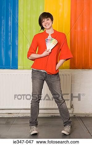 Young woman with colours View Large Photo Image Stock Photo - Young woman with colours. Fotosearch