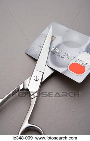 Credit card and scissors View Large Photo Image Stock Photo - Credit card and scissors. Fotosearch