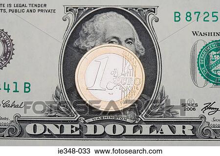 Stock Image - Euro on dollar bill. Fotosearch