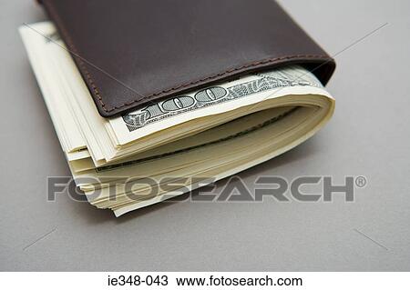 One hundred dollar bills in wallet View Large Photo Image Stock Image - One hundred dollar bills in wallet. Fotosearch
