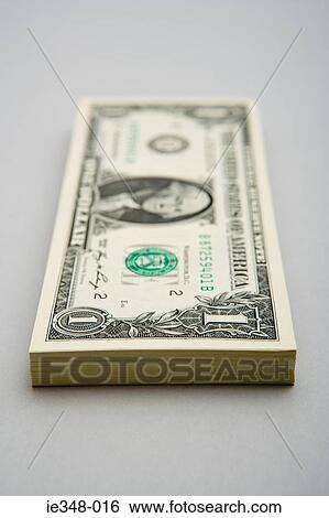 Stack of dollar bills View Large Photo Image Stock Photograph - Stack of dollar bills. Fotosearch