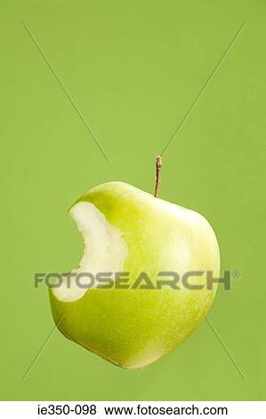 Apple with missing bite View Large Photo Image Stock Photo - Apple with missing bite. Fotosearch