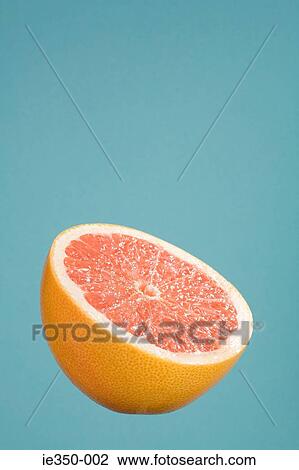 Half a grapefruit View Large Photo Image Stock Image - Half a grapefruit. Fotosearch