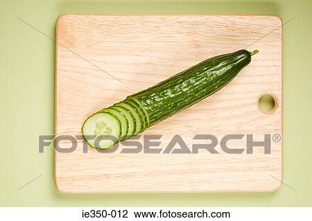 Stock Image - Sliced cucumber. Fotosearch