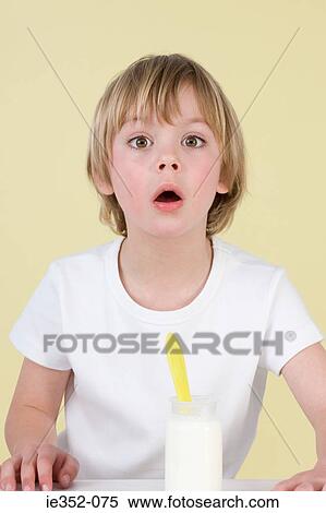Boy with yoghurt View Large Photo Image Stock Photography - Boy with yoghurt. Fotosearch