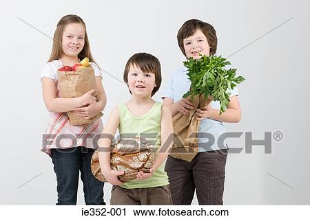 Children with groceries View Large Photo Image Stock Image - Children with groceries. Fotosearch