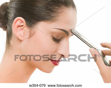 Woman with cellphone View Large Photo Image Stock Photo - Woman with cellphone. Fotosearch