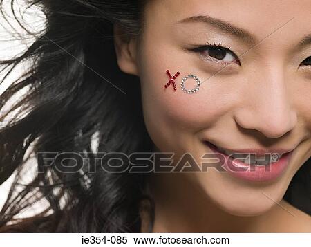 Woman with jewels on her face View Large Photo Image Stock Photography - Woman with jewels on her face. Fotosearch